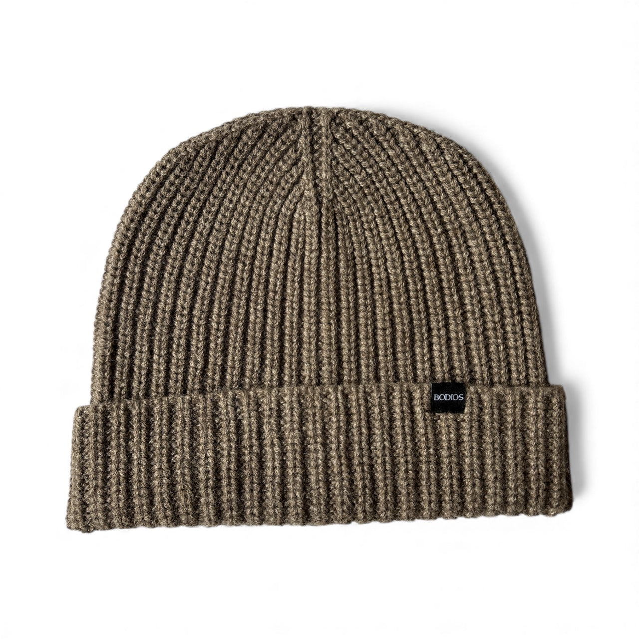 Dark grey knit beanie with a brand label on a white background